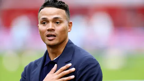 PA Media File photo 1/10/2023 of Match Of The Day and One Show presenter Jermaine Jenas who is "speaking to his lawyers" after being sacked by the BBC amid allegations he sent unsolicited messages to a female colleague.