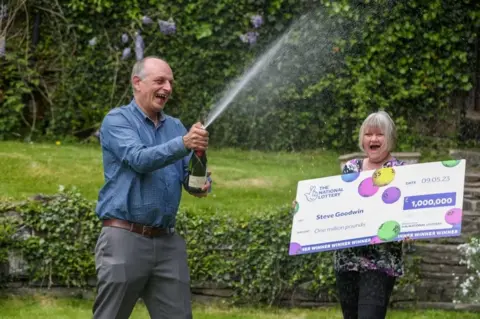 Lottery winner Steve Goodwin and Heidi Hammond