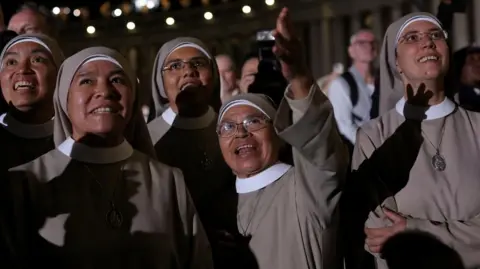 Nuns gather to watch for smoke after conclave vote 