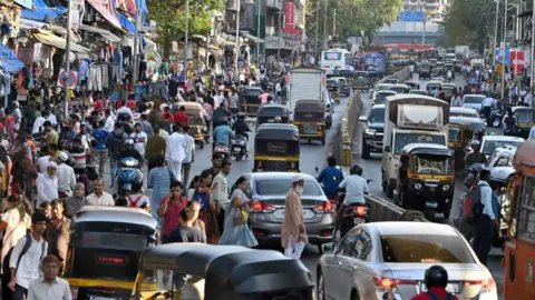  Hawkers encroach the footpath and the road outside the station, at Andheri (West), on May 2, 2023 in Mumbai, India. (Photo by Vijay Bate/Hindustan Times via Getty Images)