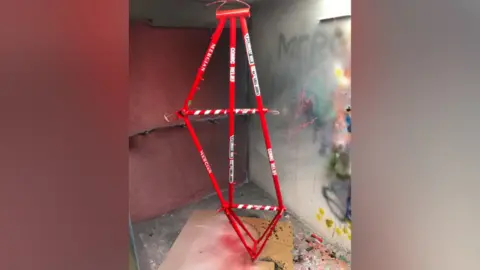 Mercian Cycles Tandem bike being spray painted red by a company in Derby