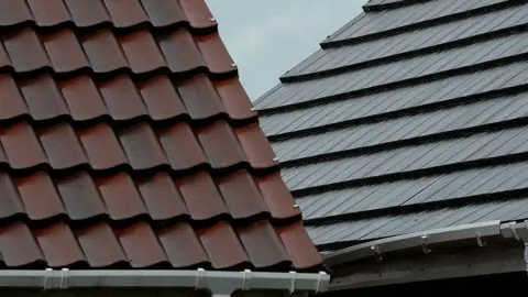 A general view picture of two roofs.