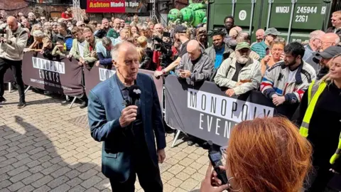Andy Kleek Photograph of the England World Cup legend Sir Geoff Hurst. The image was taken on Wood Street in the centre of Ashton-under-Lyne.