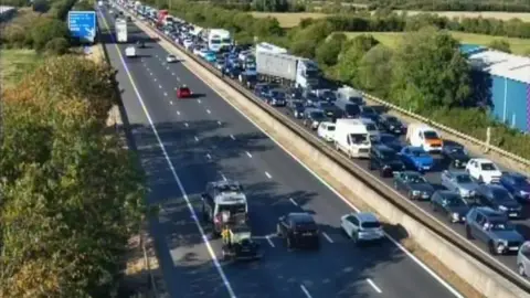 Queuing traffic on the southbound carriageway of the M5 motorway.