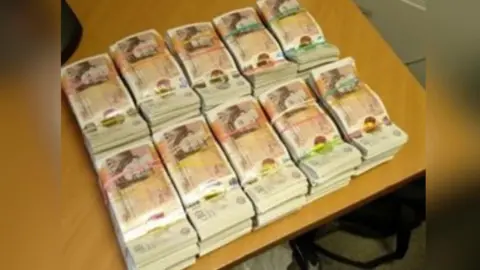 Leicestershire Police Bundles of cash