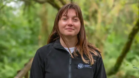 Cornwall Wildlife Trust A woman with dark hair wearing a black hoodie