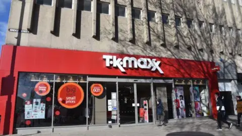 The front of the building when it was a TK Maxx, with the red and white signage on the front.
