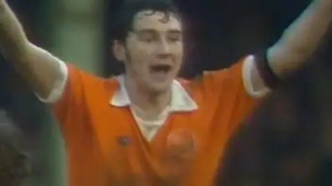 BBC Sport Mickey Walsh in tangerine celebrates his winning goal