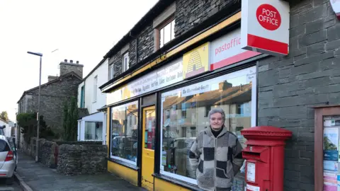 Graham Livesey outside his post office branch