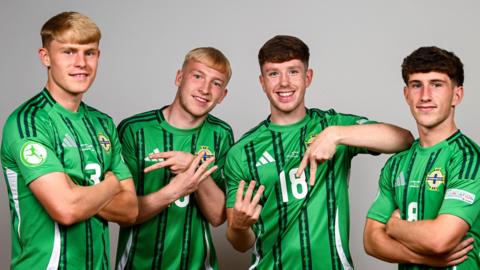 The Uefa European Under-19 NI players in green football tops 