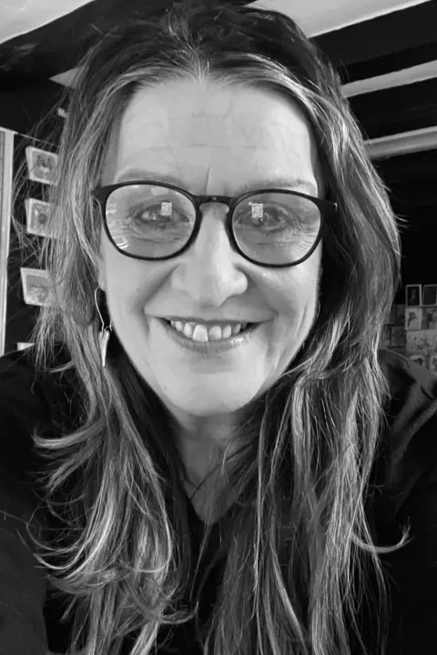 Caroline Jones Black and white photo of Caroline Jones who had a melanoma diagnosis six years ago