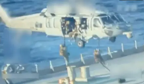 US forces abseil on to an oil tanker in a video released on 10 December 2025