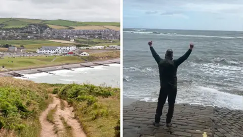 St Bees beach is pictured in the background on the left, with danny savage celebrating the end of his walk on the right