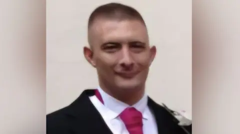 Ashley Menzel in a wedding suit