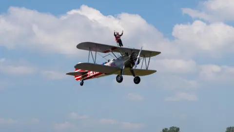 Victoria Bryan Esther Hussey doing the wing walk
