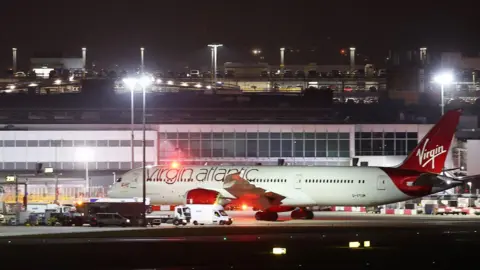 Getty Images A Virgin Atlantic plane in the dark