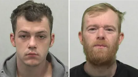 Mugshots of Defty and Baird. Defty is clean shaven with short dark hair. Baird has a ginger beard and short ginger hair.