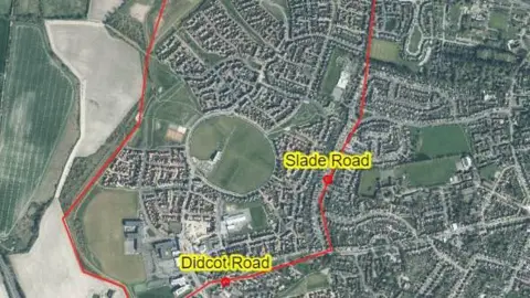 Thames Valley Police A Google Earth map with a red line outlining a residential area surrounding an oval park