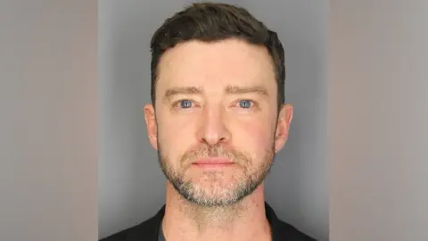 Sag Harbour Police Department Justin Timberlake headshot in mugshot style