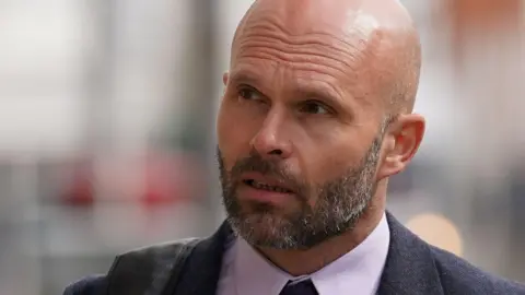 PA PC Daniel Julian, who serves with Sussex Police, arrives at Lewes Crown Court