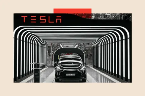 Getty Images Tesla logo and car surrounded by lights