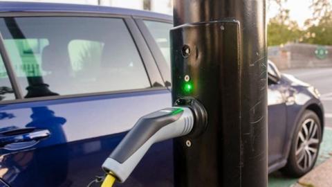 Electric car charging point from a street light