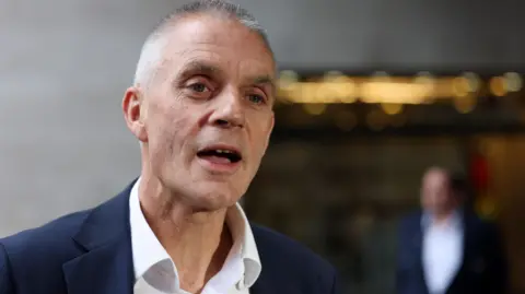 EPA Outgoing BBC Director-General Tim Davie speaks upon his arrival at the BBC headquarters in London, Britain, 11 November 2025. 