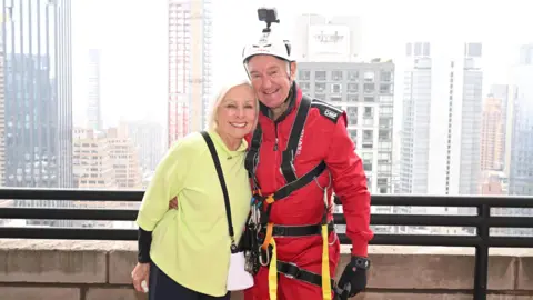 Outward Bound Bill Roberts and wife Maggie on Empire State building