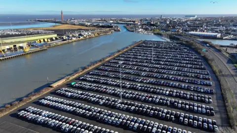 Getty/Christopher Furlong General view of Alexandra Dock in Grimsby, with hundreds of cars parked at the quayside.
