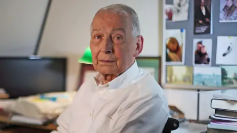 PA Frank Field sits in an office