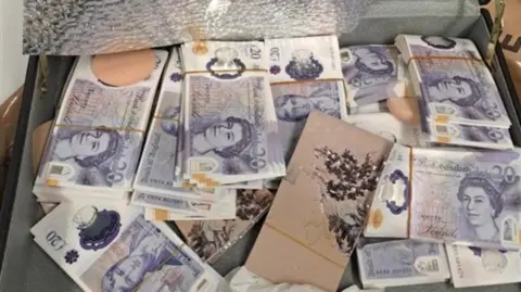 A case of counterfeit £20 notes
