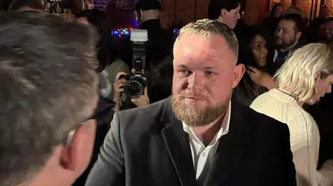 Getty Images Image shows the Democratic candidate, union leader Taylor Rehme