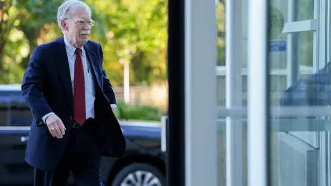 Getty Images John Bolton arriving at court 