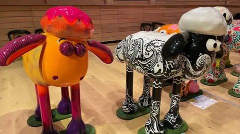 BBC/Will Flockton & Hanna Neter Decorated Shaun the Sheeps waiting to be auctioned for charity