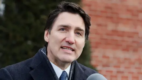 Canada's Prime Minister Justin Trudeau speaks to reporters, announcing he intends to step down as Liberal Party leader