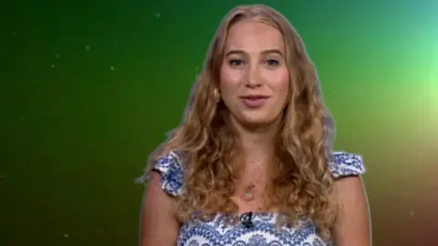 Sophia Herod over a picture of a rainbow in space
