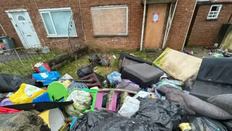 Local Democracy Reporting Service Waste left outside a property 