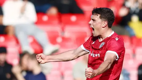 Dara Costelloe celebrates for Accrington Stanley.