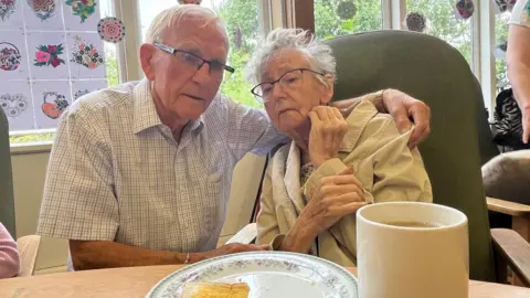 Kevin Shoesmith/BBC David Conner hugging wife Shirley