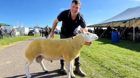 David Gray from near Selkirk with his £35,000 Texel tup