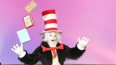 Chris Haston/WBTV via Getty Images A person dressed Cat in the Hat character 