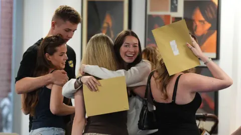 Students receive their A-level results at Solihull School.