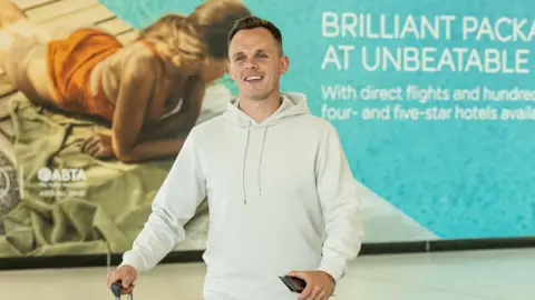 Lawrence Shankland at Glasgow Airport