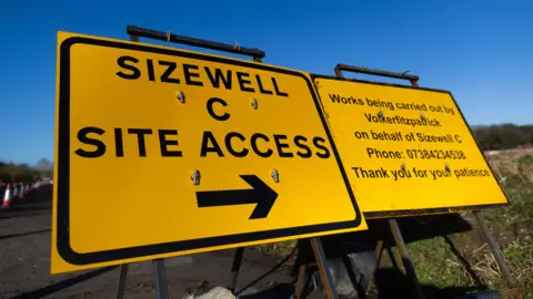 Getty Images Large yellow sign at Sizewell C saying 'site access'
