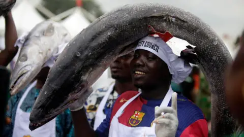 Adekunle Ajayi/Getty Images A fisherman displays their produce at the Lagos State Ministry of Agriculture and Food Systems marking the 2024 World Food Day - Wednesday 16 October 2024.