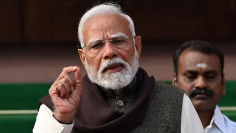 Narendra Modi, India's prime minister, speaks during a news conference at Parliament House in New Delhi, India, on Friday, Jan. 31, 2025. Modi said the upcoming budget will provide energy and confidence to the country as it moves toward achieving its goal of becoming a developed nation by 2047. 