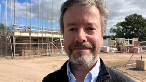 Andy Faizey from Lioncourt Strategic Land at a building site in Worcester