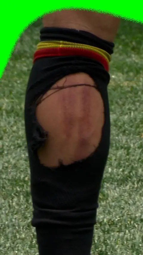 Iran's Alireza Jahanbakhsh tears through Leandro Trossard's sock
