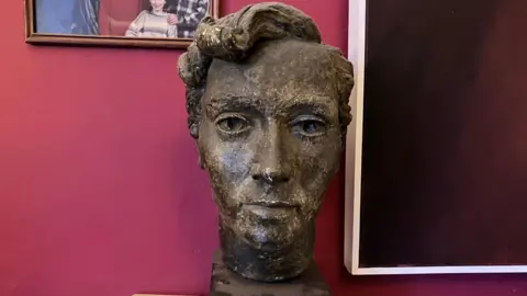 A bust of Glenys, created by Ronald