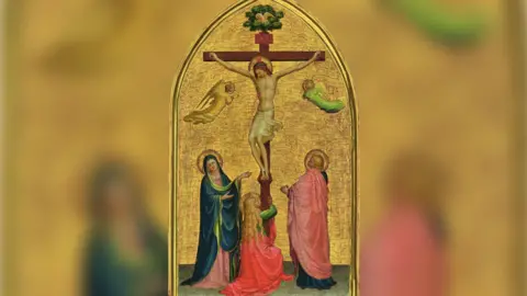 PA Media Undated documentary photograph issued by Christie's of the Crucifixion of Fra Angelico painted in the 1420s is the earliest surviving panel painting by the artist. The Crucifixion with the Virgin, Saint John the Evangelist and Magdalene.